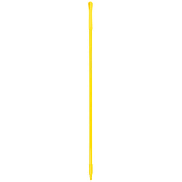 A yellow Carlisle fiberglass stick with threads on the end.