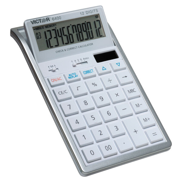 A Victor 6400 calculator with a white display and silver buttons.