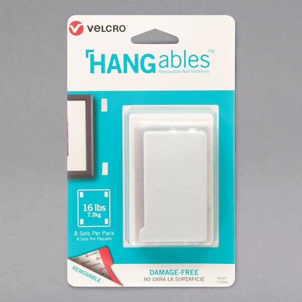 A package of 8 white rectangular Velcro HANGables.