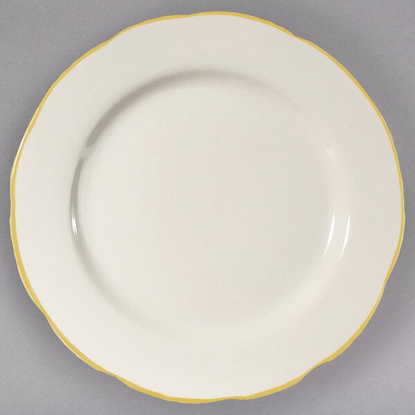 5 1/2" Ivory (American White) Scalloped Edge China Plate with Gold Band - 36/Case