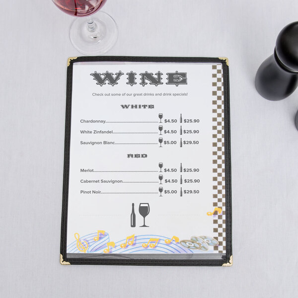 An 8 1/2" x 11" menu with a Retro Jukebox design on the right insert on a table with a glass of wine.