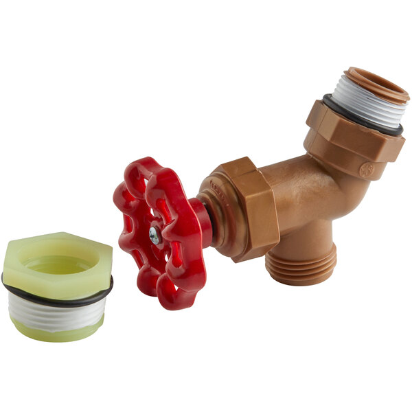 A close-up of a red valve with a white and green object.