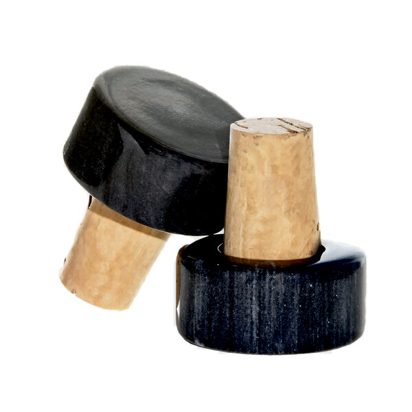 Two black marble Franmara wine stoppers.