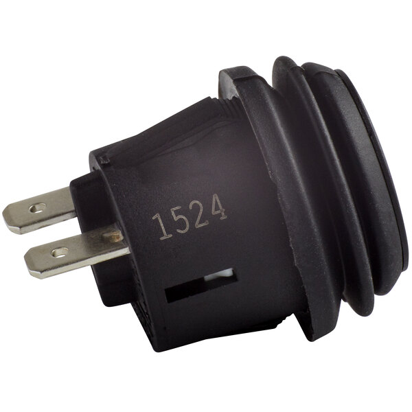 A black round push button switch with a round black cover.