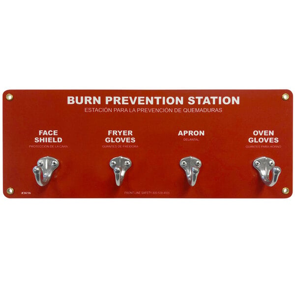 A red Front Line burn prevention station with three hooks.