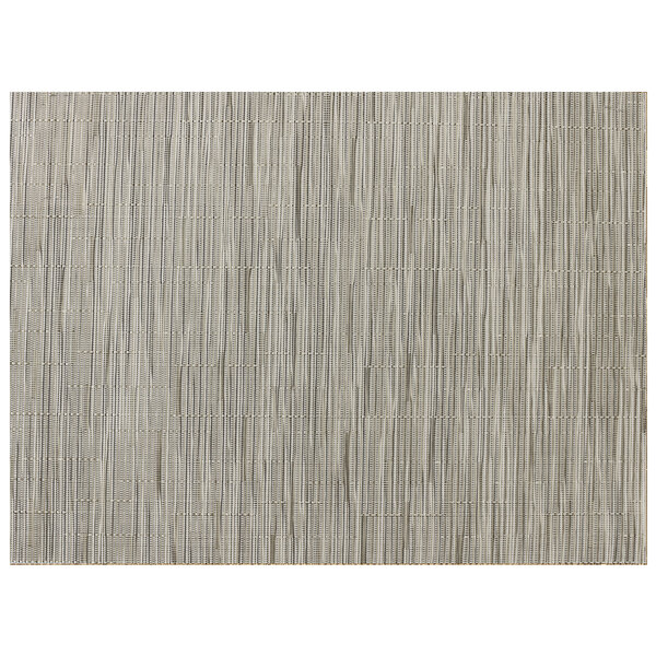 A close-up of a gray and white striped woven vinyl placemat.