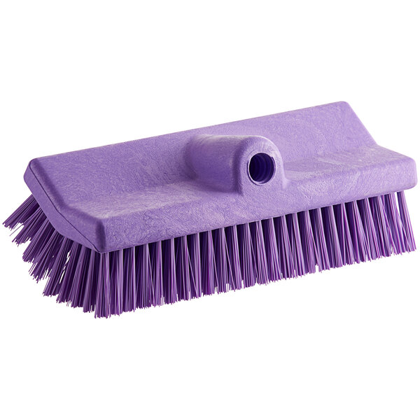 A purple Carlisle Sparta Hi-Lo floor scrub brush with bristles and a hole in the handle.