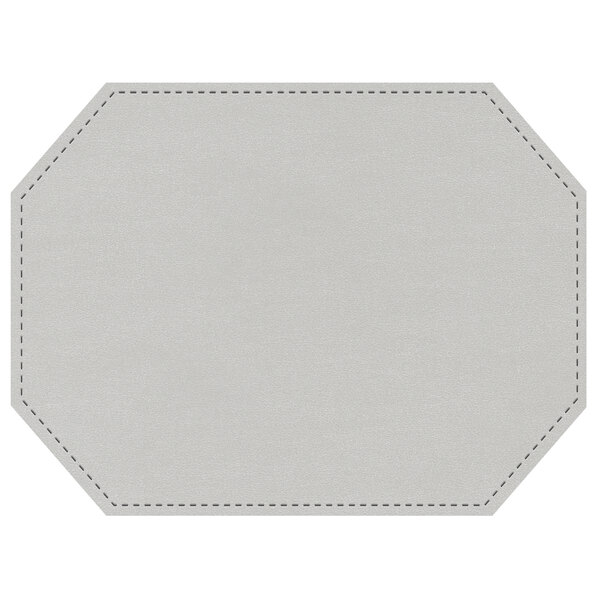 A white octagon shaped placemat with stitching.