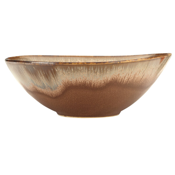 A brown Libbey Hedonite porcelain bowl with white specks.