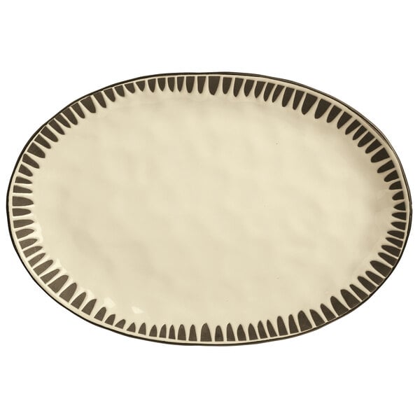 A white oval stoneware platter with black lines.