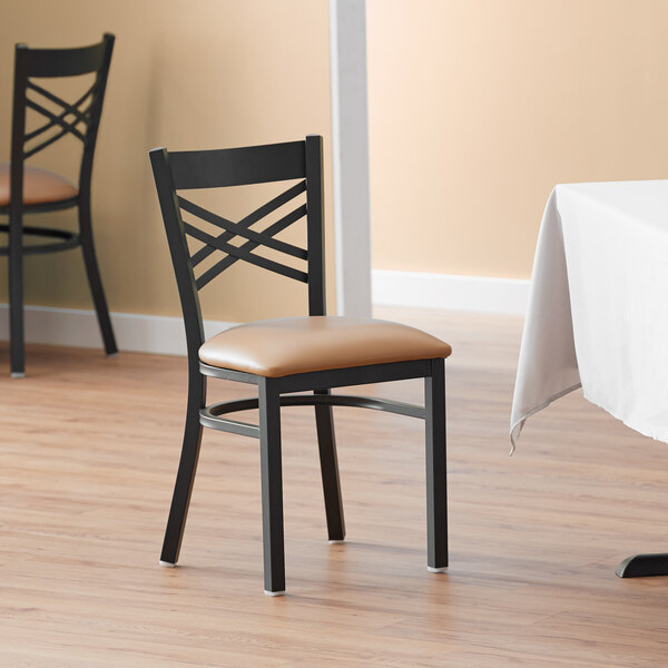 Lancaster Table & Seating Black Finish Cross Back Chair with 2 1/2" Light Brown Vinyl Padded Seat