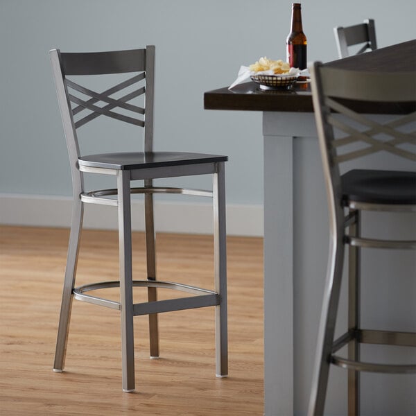 Lancaster Table & Seating Clear Coat Steel Cross Back Bar Height Chair with Black Wood Seat - Detached Seat