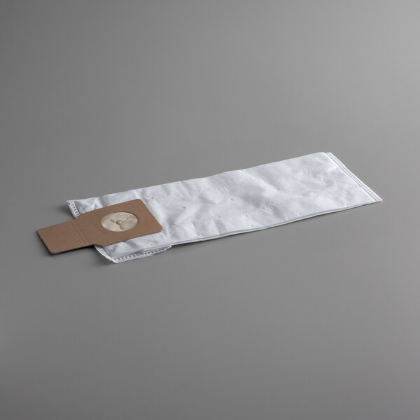 A white paper bag with a brown label.
