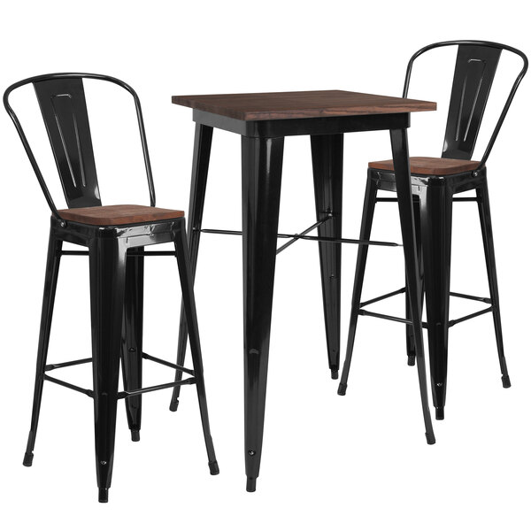 A Flash Furniture rustic galvanized steel and wood pub table and two barstools.