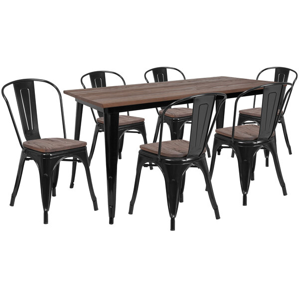 A black rustic wood and galvanized steel table and chair set.