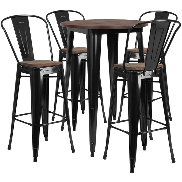 A Flash Furniture black metal bar table with black metal and wood chairs around it.