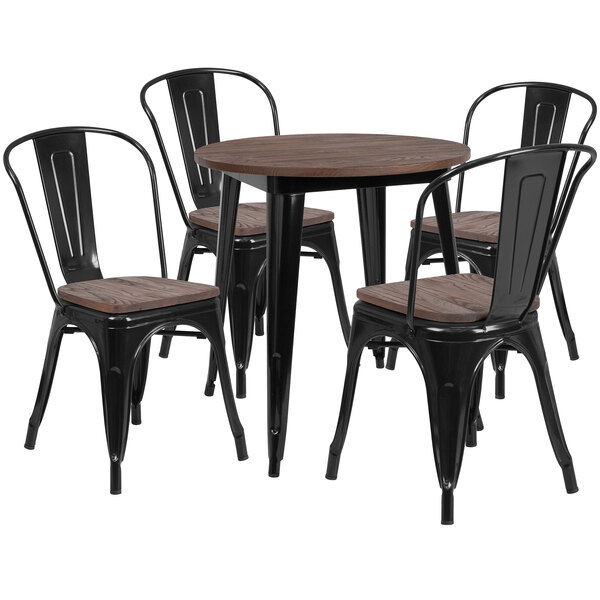A Flash Furniture black metal table with a wood top and four chairs.