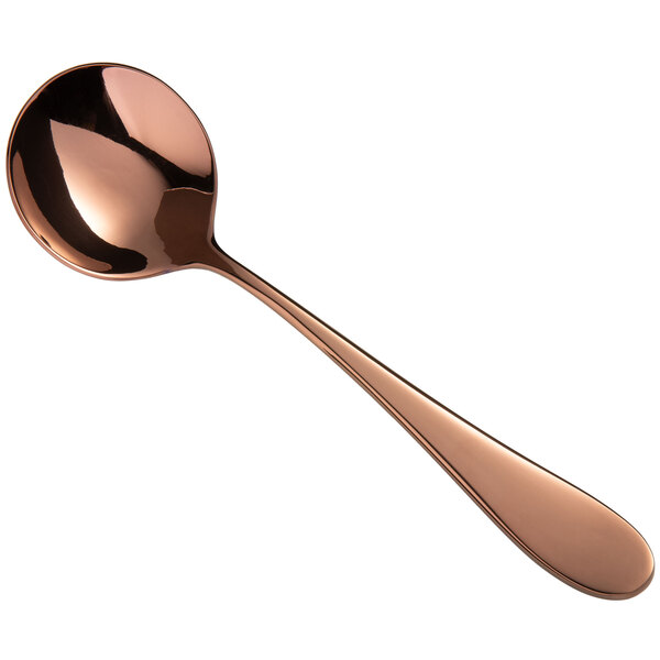A Libbey Santa Cruz copper bouillon spoon with a handle.