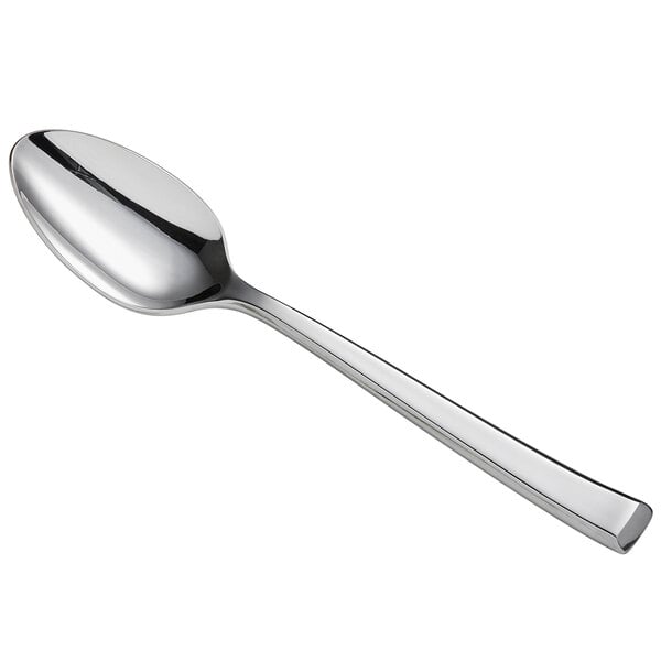 A silver spoon with a stainless steel handle.
