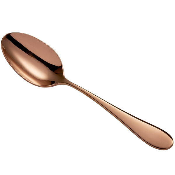 A close-up of a Libbey Santa Cruz copper dessert spoon with a rose gold handle.