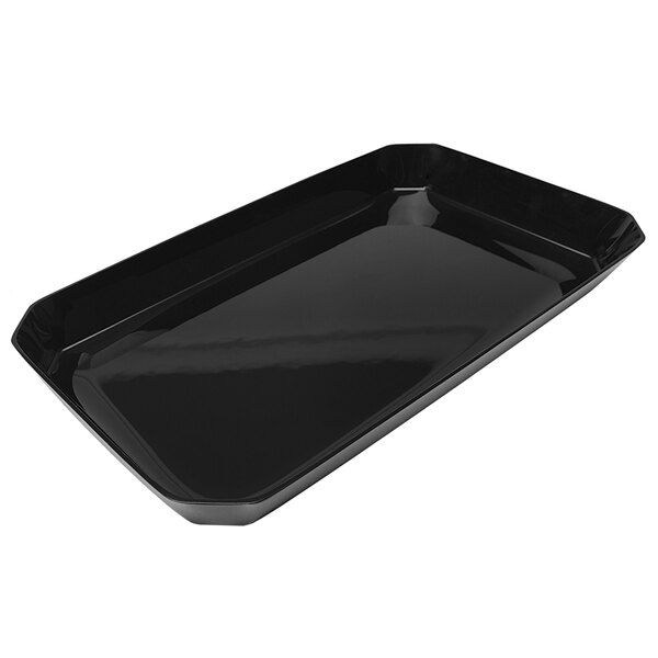 A black rectangular Delfin acrylic bowl with cut corners on a counter.