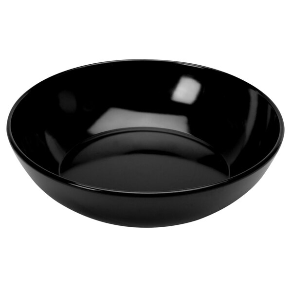 A black Delfin Pacific Rim melamine bowl with a curved edge.