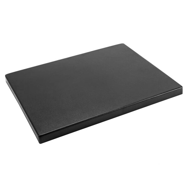 A black rectangular Delfin ABS riser on a white table.