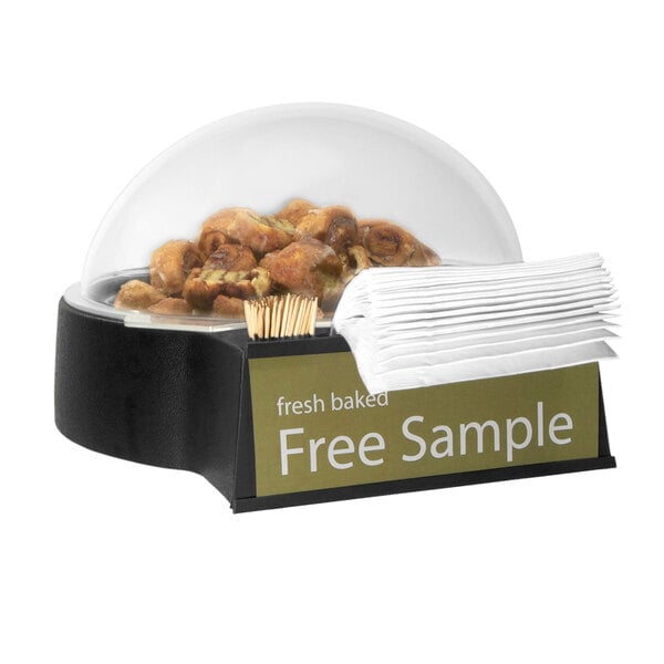 A Delfin countertop sample dome with food on a tray.