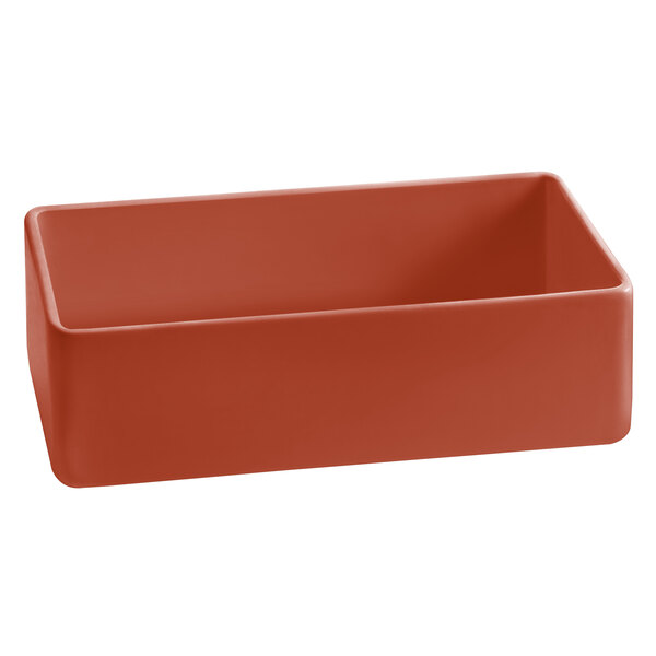 A red rectangular Tablecraft copper bowl on a counter.