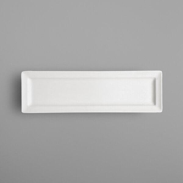 A RAK Porcelain ivory rectangular platter on a gray background.