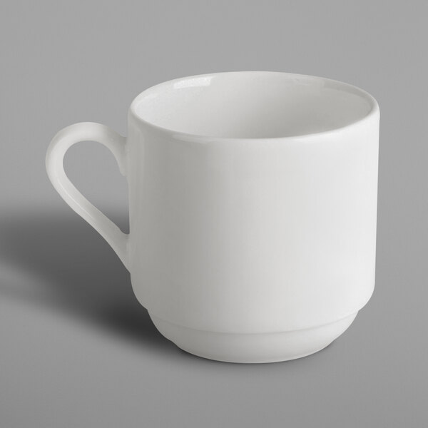 A RAK Porcelain ivory porcelain tall stackable cup with a handle on a white background.