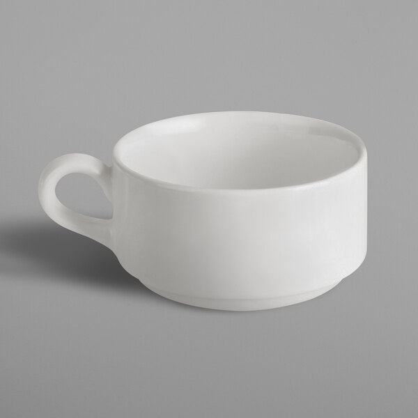 A white RAK Porcelain tall stackable cup with a handle.