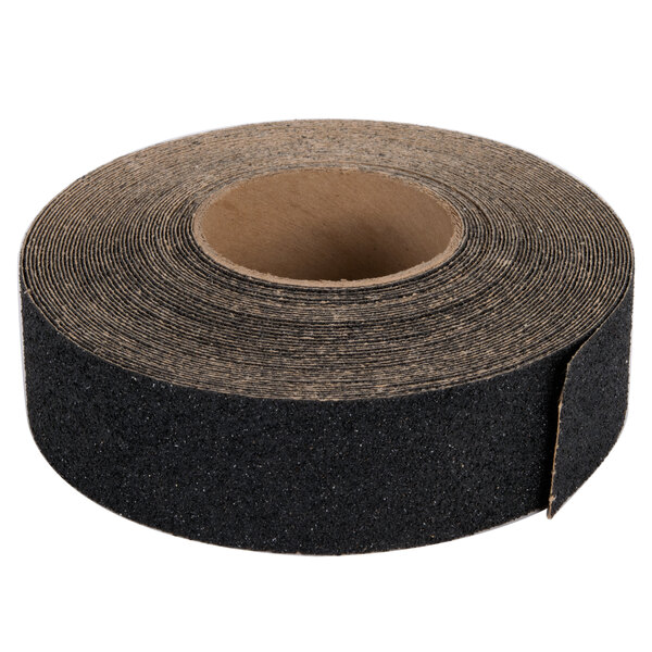 A roll of black tape with a brown band.