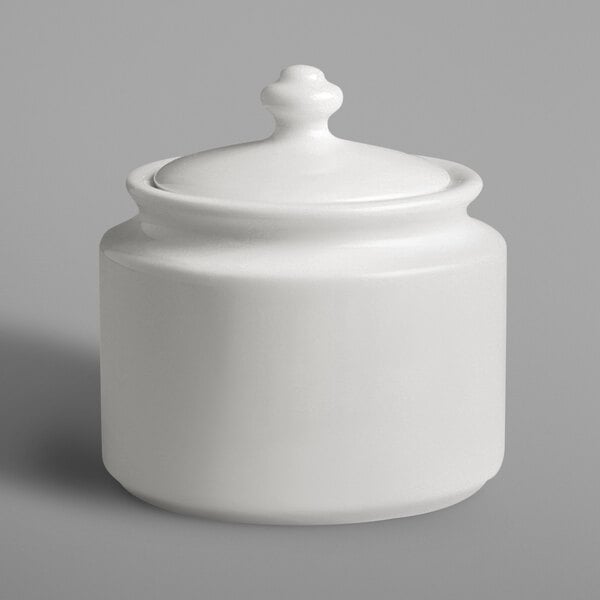 A RAK Porcelain ivory ceramic sugar bowl with lid.