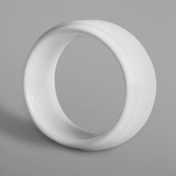 A close-up of a white RAK Porcelain napkin ring.