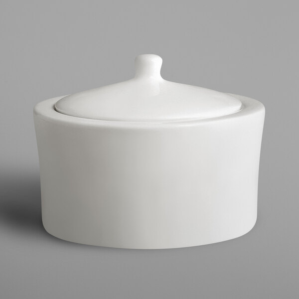 A RAK Porcelain ivory porcelain sugar bowl with a lid.