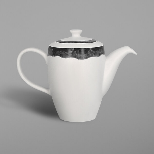 A white porcelain teapot with a beech grey lid and handle.