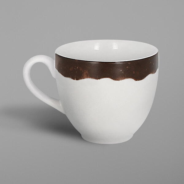 A white porcelain coffee cup with a brown oak design.