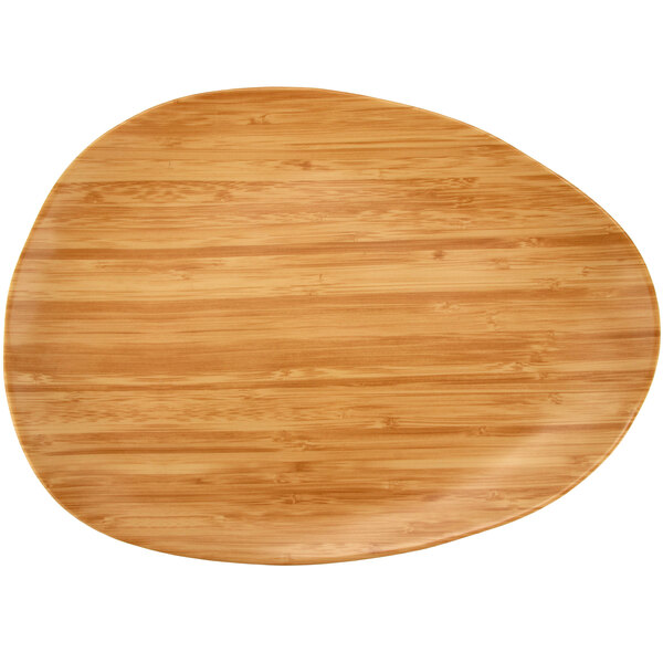 A curved melamine serving board with a faux bamboo pattern.