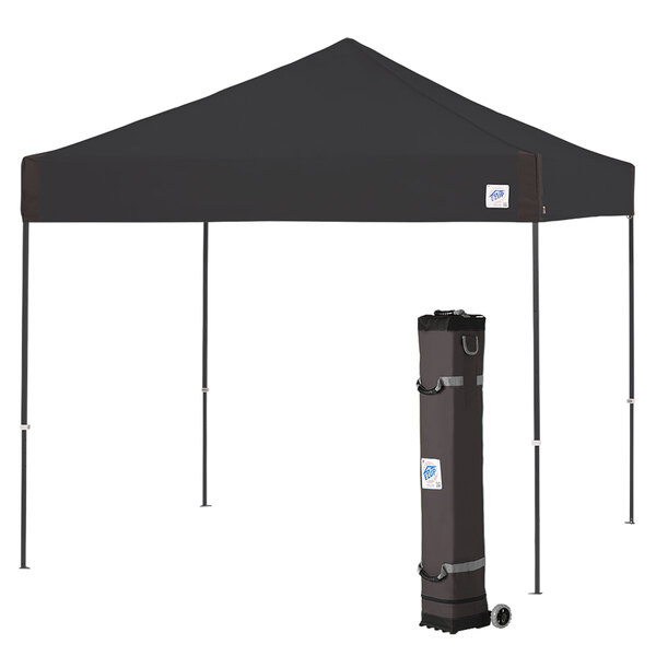 A black E-Z Up canopy with a black bag on top.