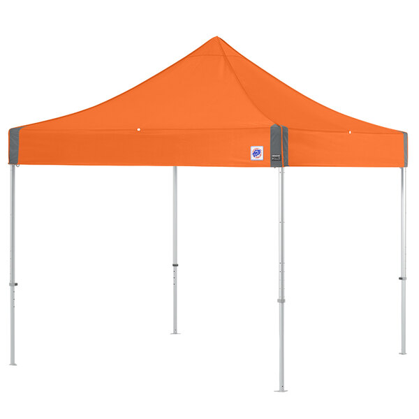 An orange E-Z Up canopy with a steel frame.