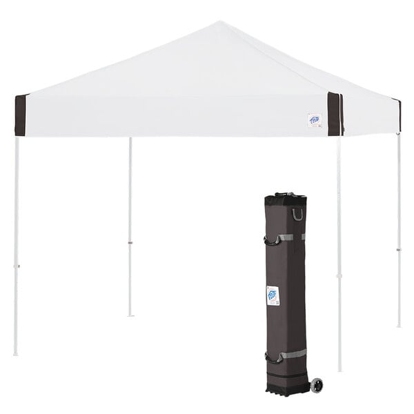 A white E-Z Up canopy with a white bag on it.