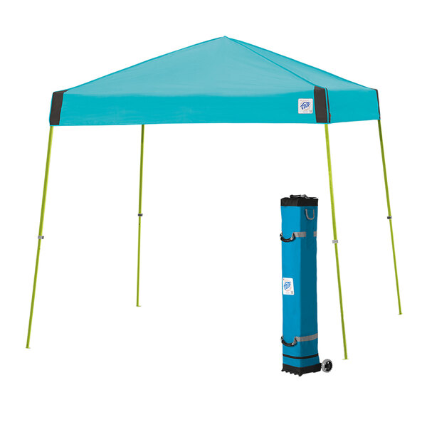 A blue E-Z Up canopy with a limeade frame and a blue bag on it.