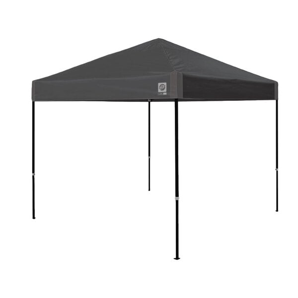 A grey E-Z Up Ambassador canopy with poles.