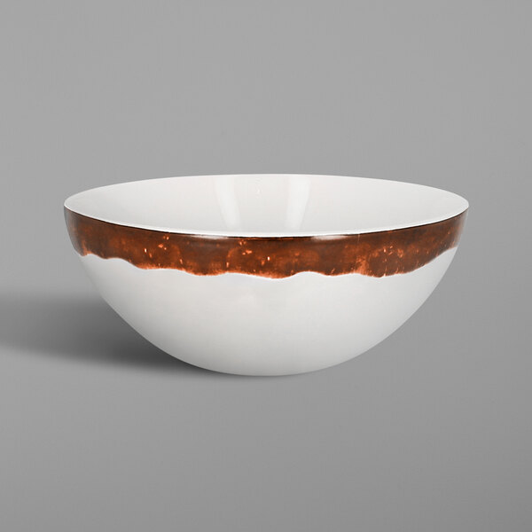 A white RAK Porcelain Woodart bowl with a brown rim.