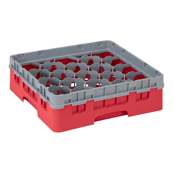 A red and grey plastic Cambro glass rack with 20 compartments and an extender.