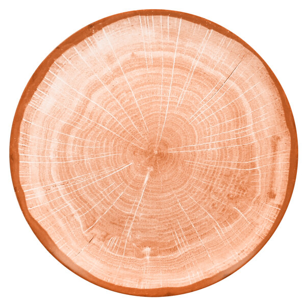 A close up of a RAK Porcelain Woodart Cedar Orange flat coupe plate with a wood grain design.