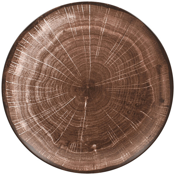 A RAK Porcelain Oak Brown Woodart flat coupe plate with a tree trunk design on porcelain.