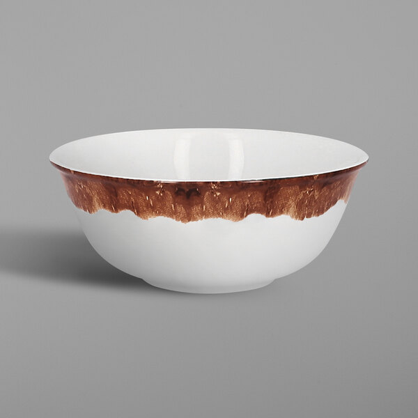 A white porcelain bowl with brown walnut trim.
