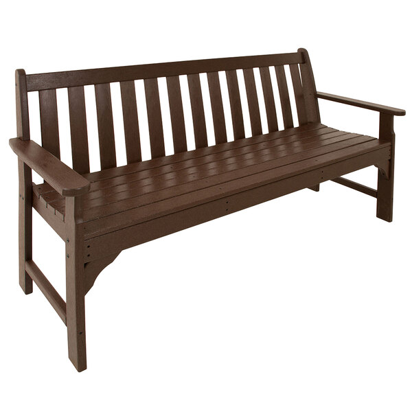 A brown POLYWOOD wooden bench with armrests.